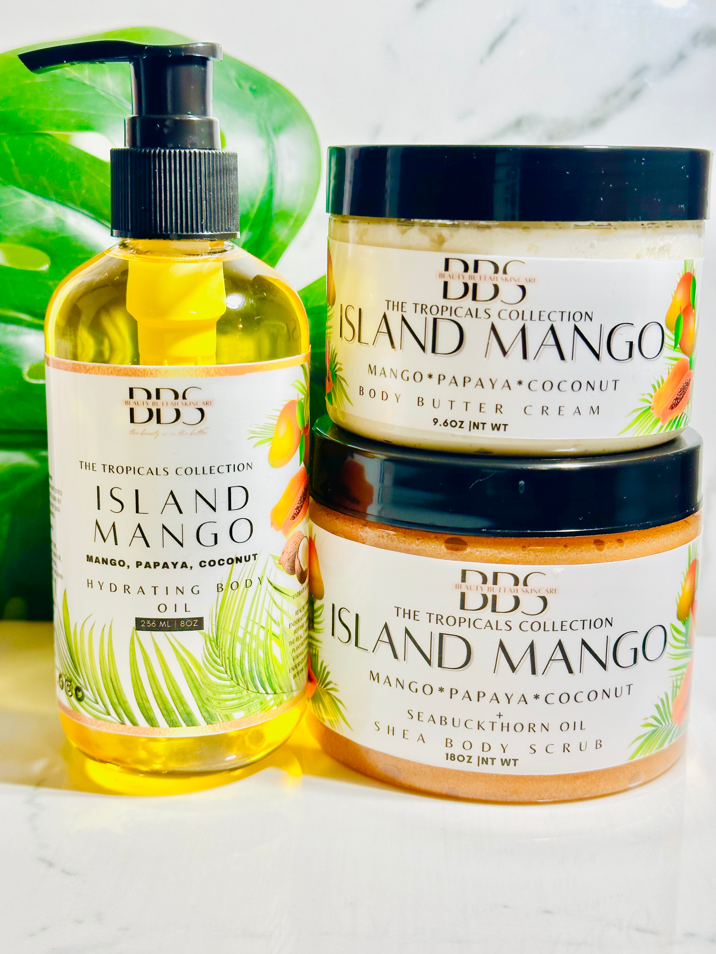 Trio bundle of body oil, body butter cream and body scrub in Island Mango from our The Tropicals Collection